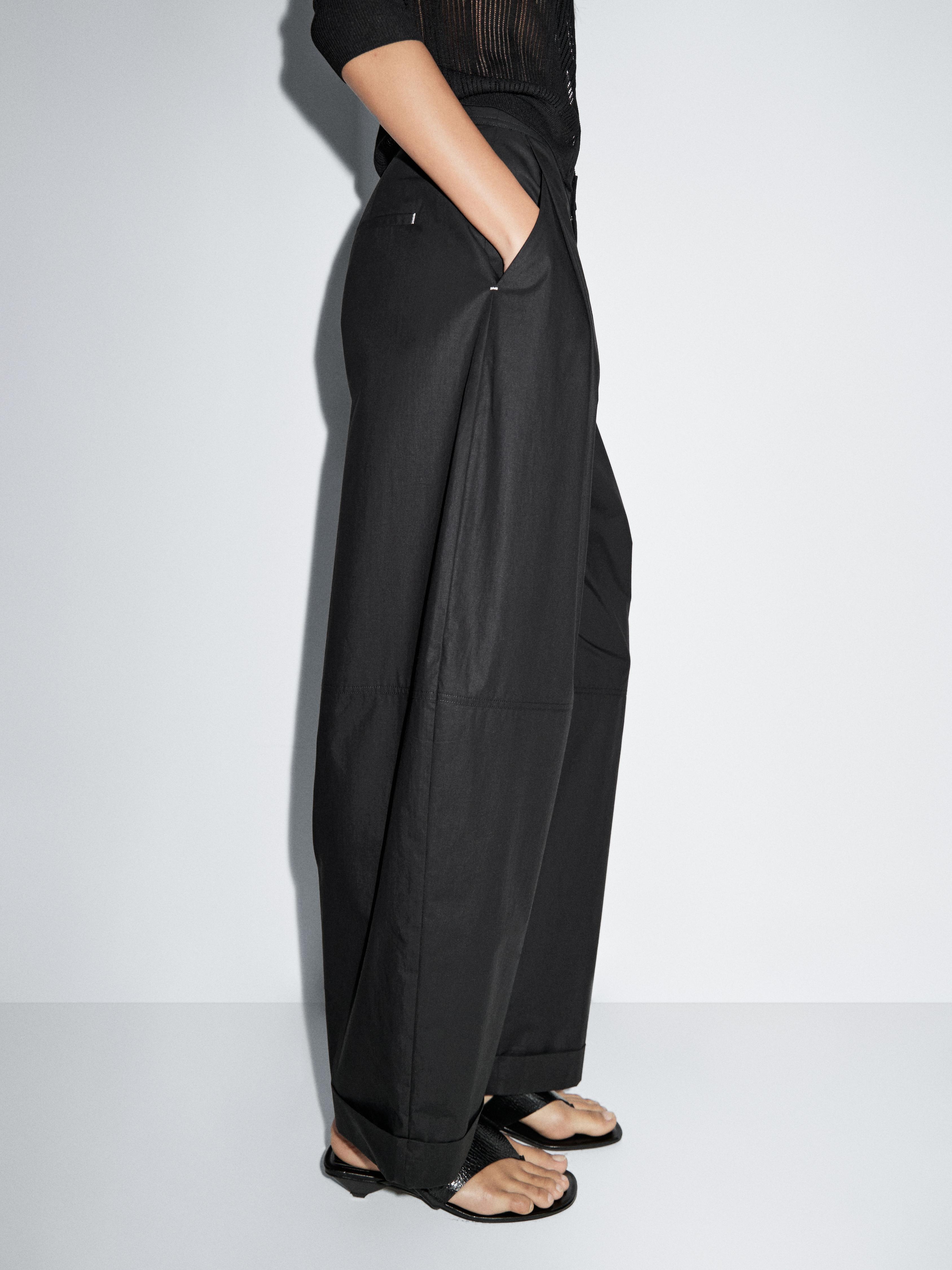 Barrel fit trousers with turn-up detail